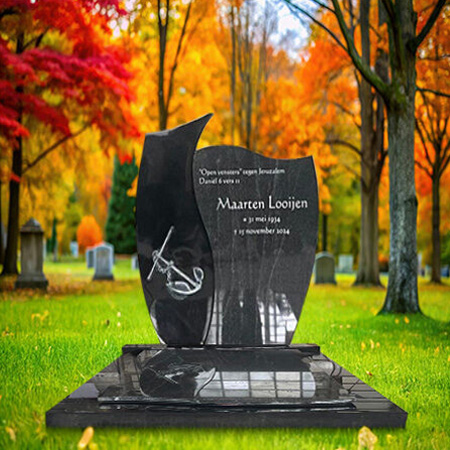 "Polished black and grey granite upright headstone with full ledger base and grave cover in traditional two-tone memorial configuration."