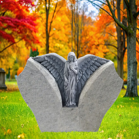 "Gray granite upright headstone memorial with sculpted angel, matte relief background, polished inscription panel, and solid base—symbolizing protection and spiritual remembrance."