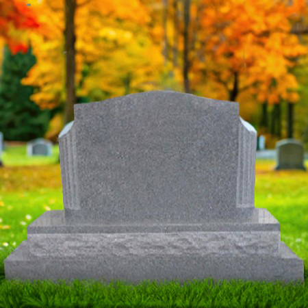 "Gray granite upright headstone memorial with arched top and tiered chiseled base—crafted for engraved inscription and structural clarity."