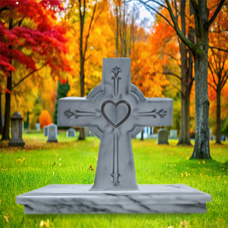 "White marble upright headstone memorial with engraved cross, heart-shaped center, fine artwork, and solid rectangular base—symbolizing devotion and peace."