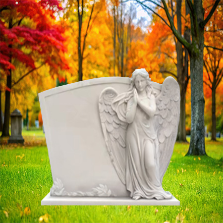 "White marble upright headstone memorial with sculpted angel, carved leaf base, and polished inscription surface—symbolizing peace and spiritual remembrance."