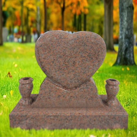 "Heart-shaped upright headstone memorial in Imperial Red Salmon granite with sculpted side vases and polished base—symbolizing eternal love and lasting remembrance."