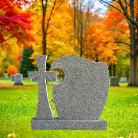 "Light brown granite upright headstone with sculpted cross, semi-circle detail, polished panel, and solid base—symbolizing protection and spiritual devotion."