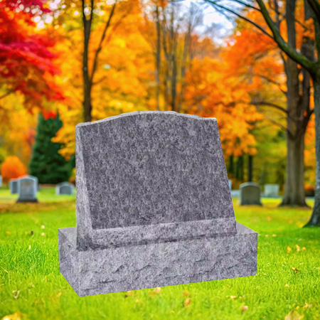 "Medium gray granite slant upright headstone with polished face and chiseled edge finishes, mounted on a granite base in a serene autumn cemetery setting."