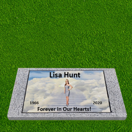 Flat granite pillow flush grass marker with porcelain stairway motif, tribute engraving, and speckled stone border.