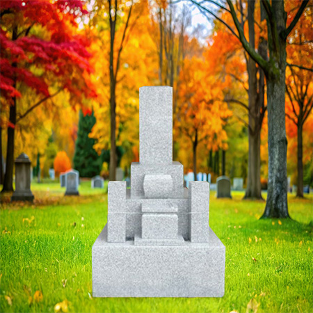"Hand-carved Japanese grey granite headstone with seven vertical pillars, flower holders, and incense stands."