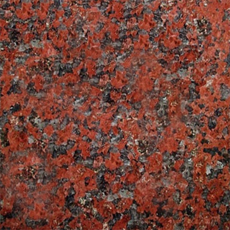 African Imperial granite headstone with rich veining and marble accents