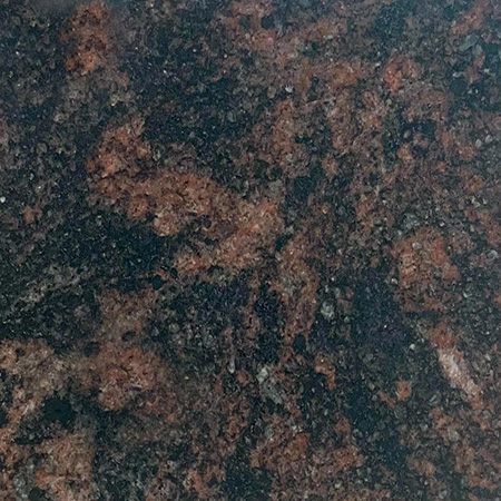 Aurora granite sample with swirling pink and grey patterns