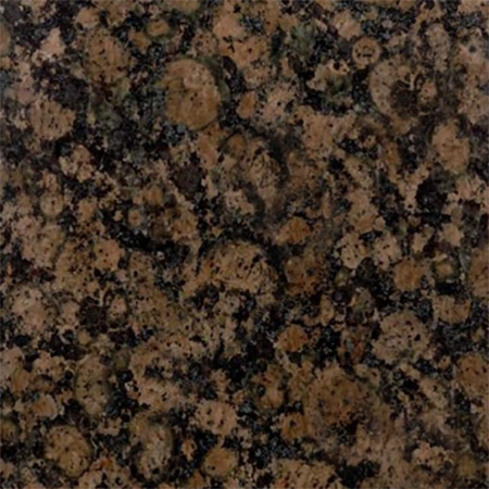 Baltic Brown granite headstone with circular mineral patterns and marble accents