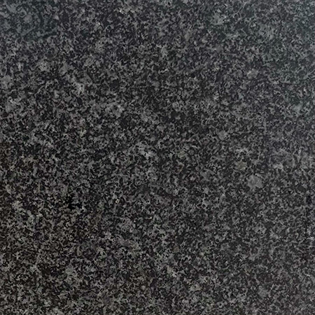 Cambodia 654 granite sample with soft grey base and fine speckling