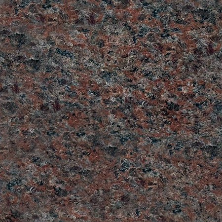 Fantasy Red granite sample with swirling red and black patterns