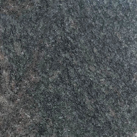 Himalayan granite sample with warm earth tones and natural grain