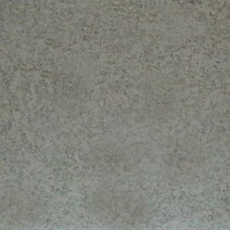 White granite sample with off-white tones and grey flecks