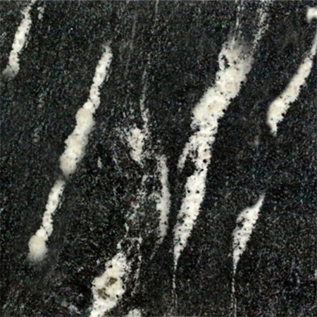 Snow Grey granite sample with soft grey tones and fine speckling