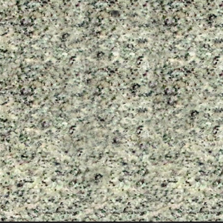 White Gran Huian granite sample with crisp white tones and subtle speckling