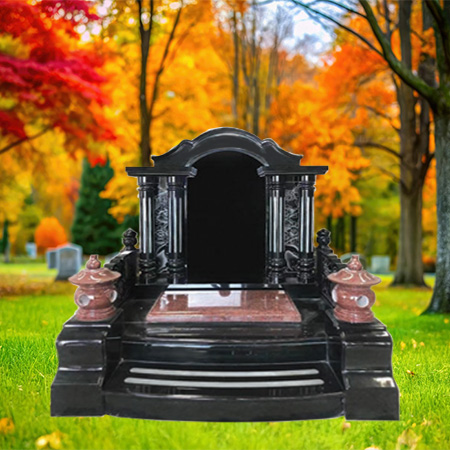 "Asian-style canopy headstone monument made of black and red granite with lantern columns, arched top, and stepped base."