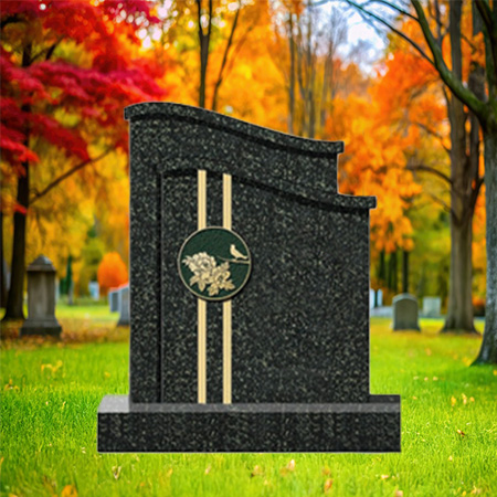 "Polished black granite upright headstone with floral-and-bird emblem and vertical accent stripes, mounted on a matching granite base."