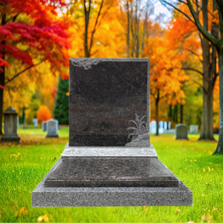 "Polished dark granite upright headstone with hand-carved shrub motif on the lower right corner, mounted on a light granite base."