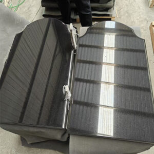 "Batch of polished black granite upright headstones with curved-top design in Elhasg factory."