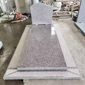 "Grey polished granite upright headstone with rectangular shape and full-length ledger featuring elevated center."