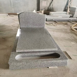 "Grey polished granite upright headstone with rectangular shape and full-length ledger featuring recessed center."